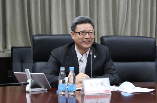 錢智民拜訪中國建材黨委書記、董事長周育先