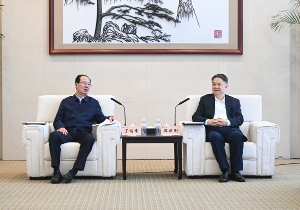 丁焰章與中國華能董事長、黨組書記溫樞剛會談